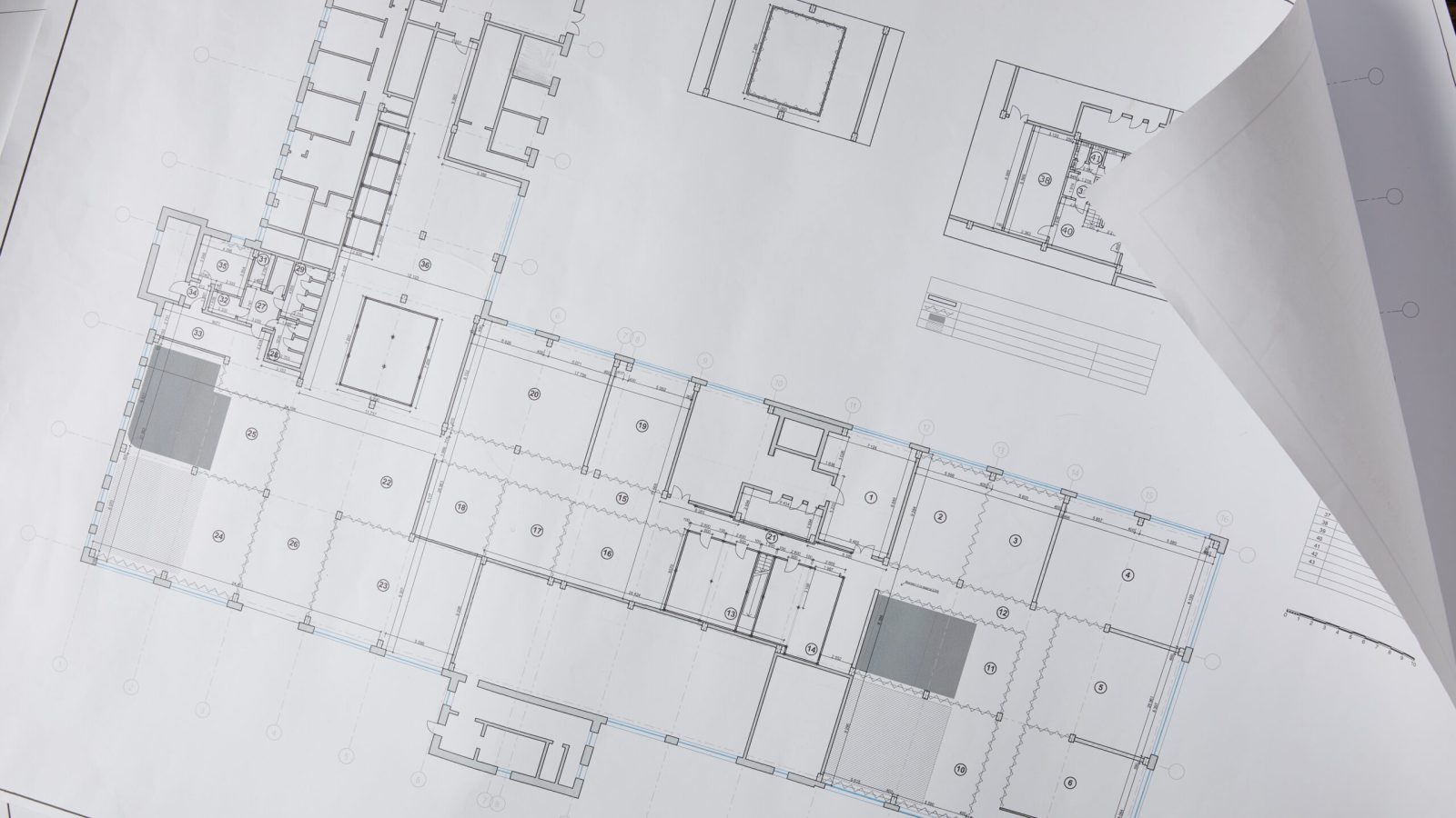 view from above of architectural blueprint on white paper